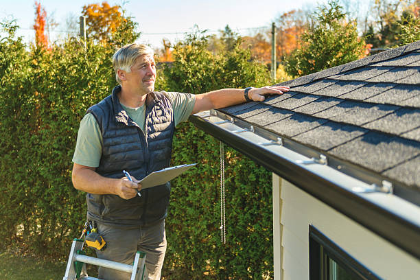Professional Flat Roof Repair technician working in Bell, CA